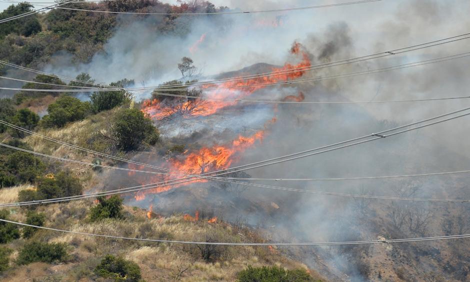 The ranch in Santa Clarita, Calif., was destroyed by the fire on Saturday despite the efforts of dozens of firefighters. Photo: Broad Image/Rex/Shuttershock