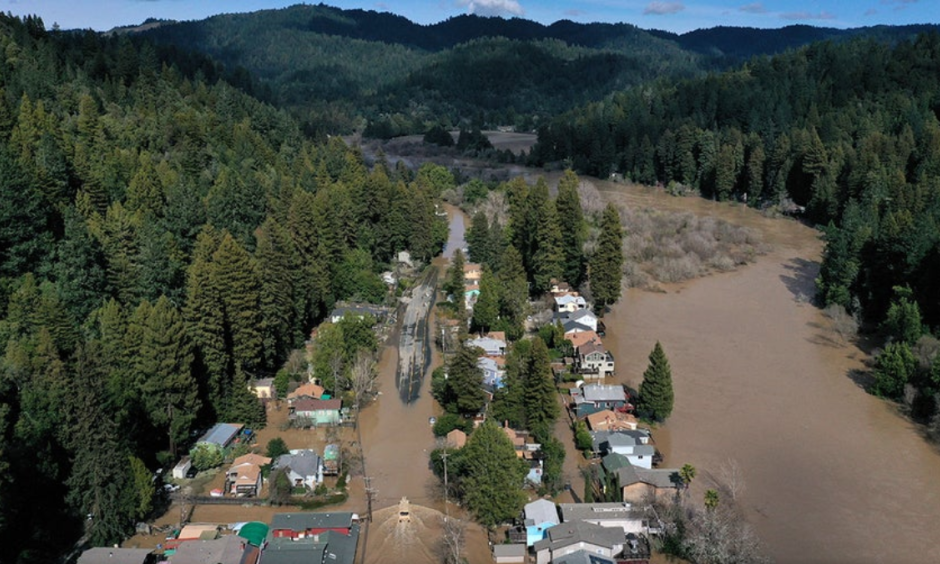 A flooded neighborhood in Guerneville, California after the Russian River crested over flood stage. Credit: Justin Sullivan/Getty Images.