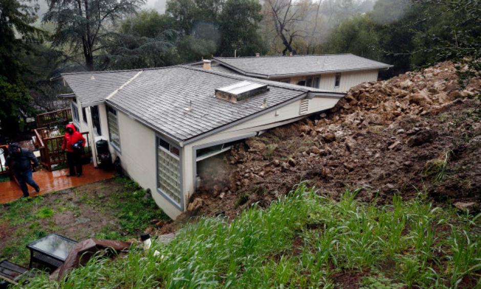 Mud and rocks hit the rear of a home on Van Tassel Lane in Orinda, Calif., resulting in the county red-tagging the home, deeming it unsafe to be in the home on Thursday, Feb. 9, 2017. Photo: Laura A. Oda, Bay Area News Group