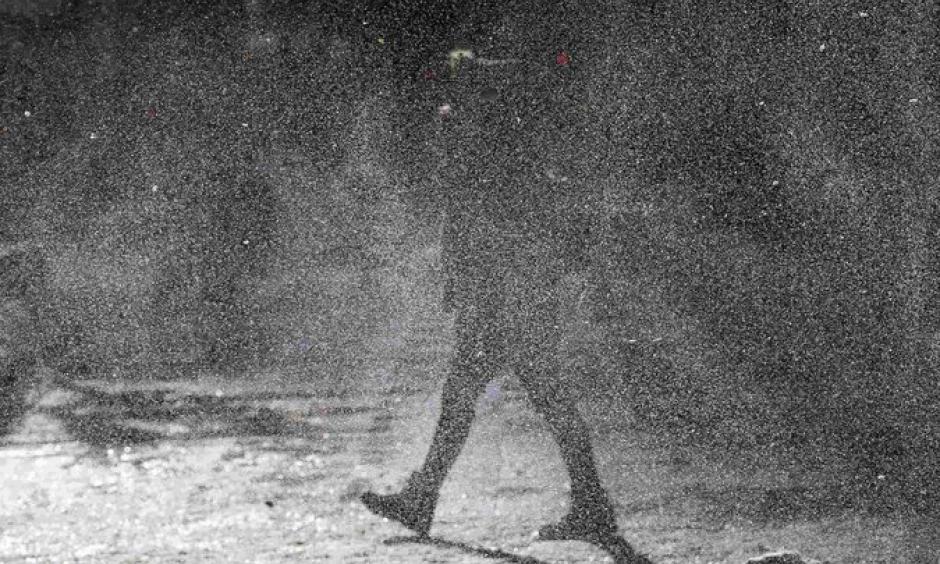 A gust of snow in Chicago on Monday. Cold weather across the country caused thousands of flight cancellations. Credit Jim Young/Reuters