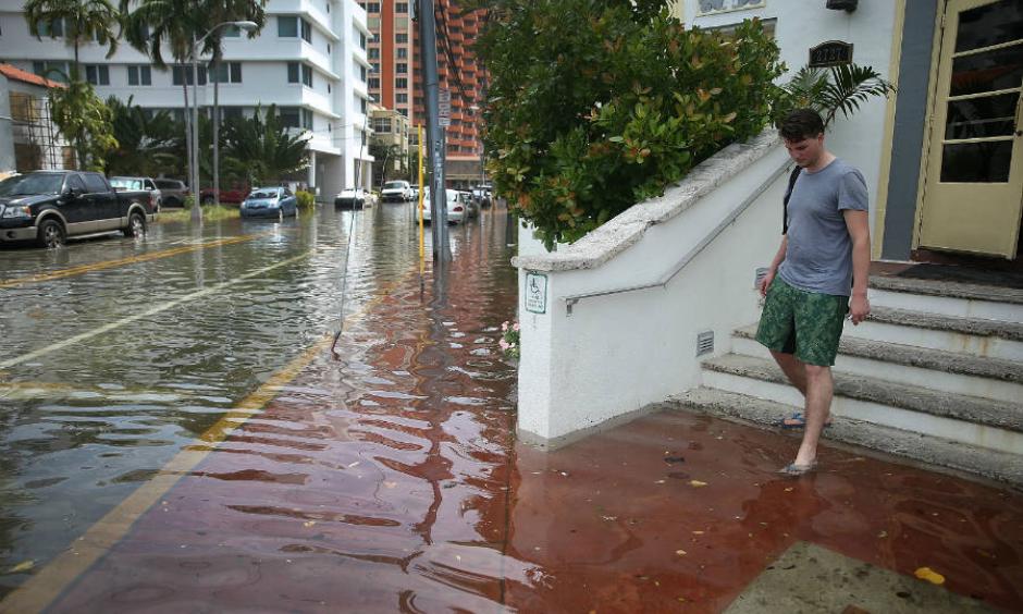 The nuisance flooding that accompanies seasonal high tides in parts of the Miami area will become more common as sea level rises. Photo: Joe Raedle, Getty Images