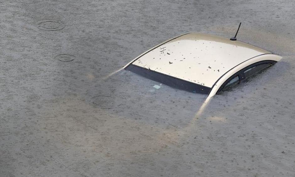 A submerged car is seen on Interstate 610 North on August 27, 2017 in Houston as the city battles with tropical storm Harvey and resulting floods. Photo: Thomas B. Shea, Getty Images