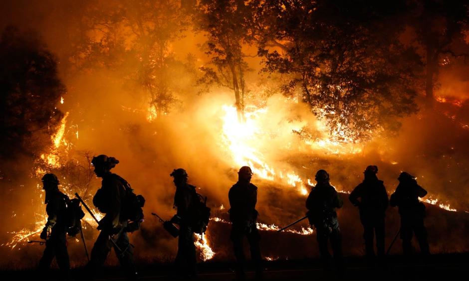 Firefighters battle the Valley Fire near Middletown, California, on September 13. Stephen Lam / Getty Images