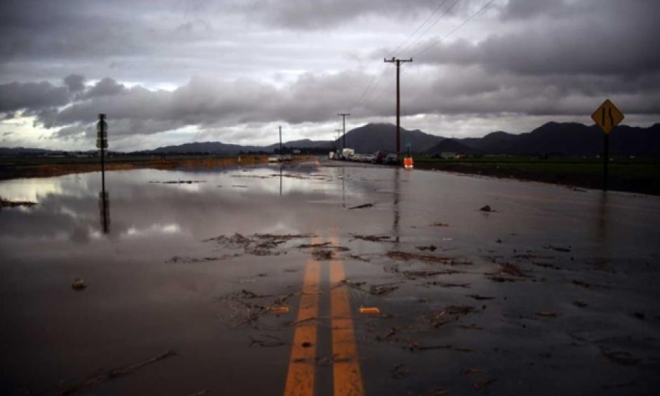 Water covers a closed Las Posas Road near Camarillo, Calif., after heavy rain from the first in a series of El Nino-influenced storms passed over the area on Wednesday, Jan. 6, 2016. Photo: Joel Angel Juáreze, AP
