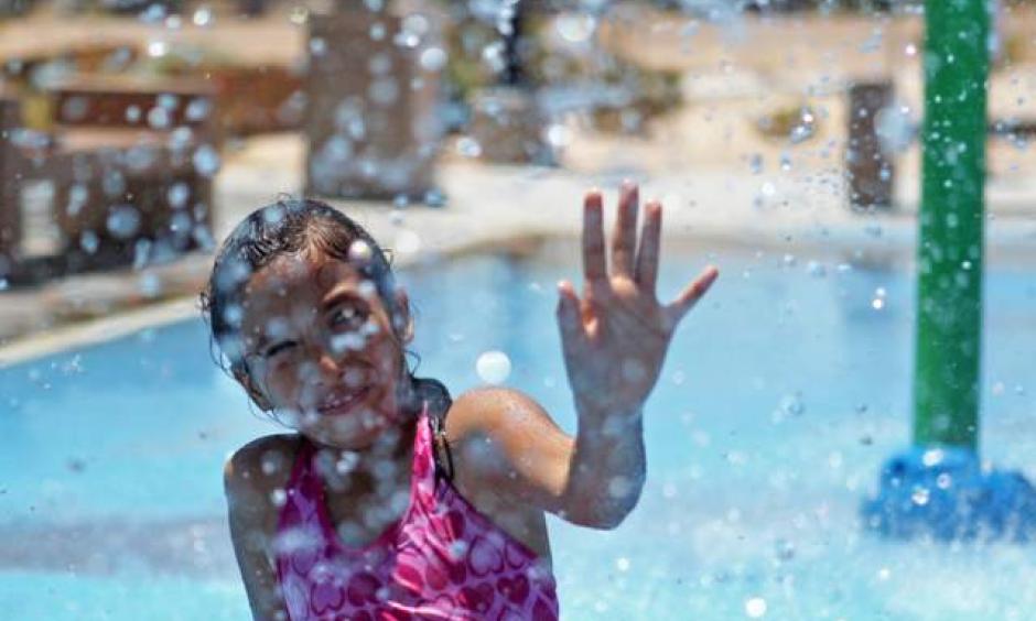 Izebelh Pin-Torres plays at the Charlie Frias Park on Wednesday, July 1, 2015, in North Las Vegas. This past June was the hottest on record. Image:James Tensuan/Las Vegas-Review Journal