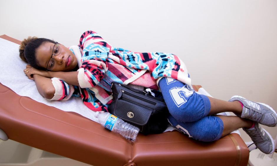 Unique Robinson, 22, of Hollywood, Fla., waits to be seen by her obstetrician, Dr. Aaron Elkin. Photo: Joshua Prezant for The New York Times
