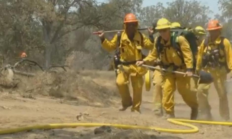 Firefighters battle the Goose Fire near Prather in California on Monday, August 1, 2016. Photo: CBS / KGPE