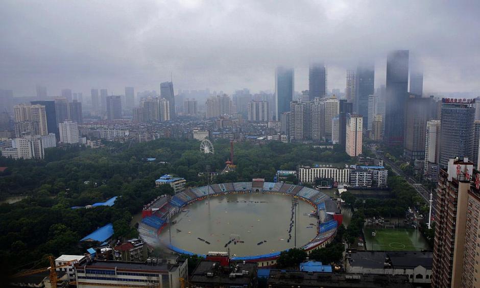 A stadium in Wuhan, China on July 6, 2016, after the city received 7.09” (180 mm) of rain in the twelve hours ending at 8 am July 6. Wuhan received over 560 mm (1.8 feet) of rain over the ten day period before the July 6 deluge, causing widespread damage and chaos. Photo: Wang He/Getty Images