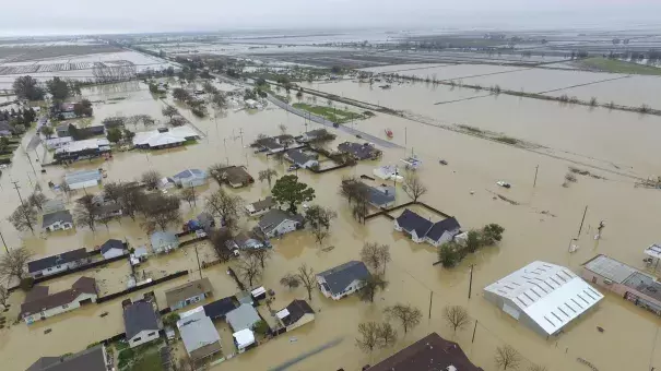 This Saturday, Feb. 18, 2017, aerial photo, shows major flooding in Maxwell, Colusa County, Calif. Water is receding in the farm community of Maxwell, where dozens of people sought higher ground after creeks topped their banks and inundated houses on Friday, said Colusa County Assistant Sheriff Jim Saso said. HECTOR INIGUEZ VIA AP