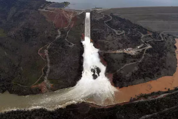 The Oroville Dam spillway releases 100,000 cubic feet of water per second down the main spillway, on Feb. 13. Photo: Josh Edelson, AFP via Getty Images