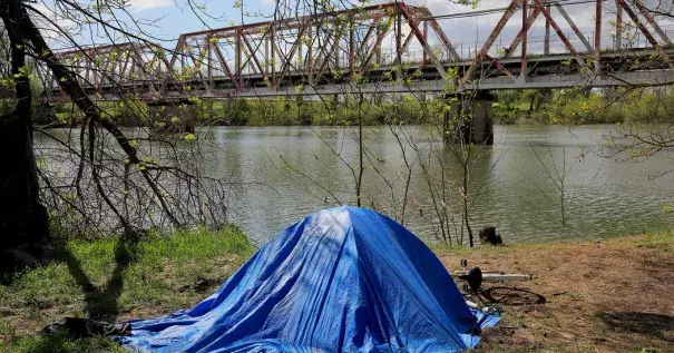 A homeless campsite along the American River in Sacramento in March. Photo: Jim Wilson, The New York Times