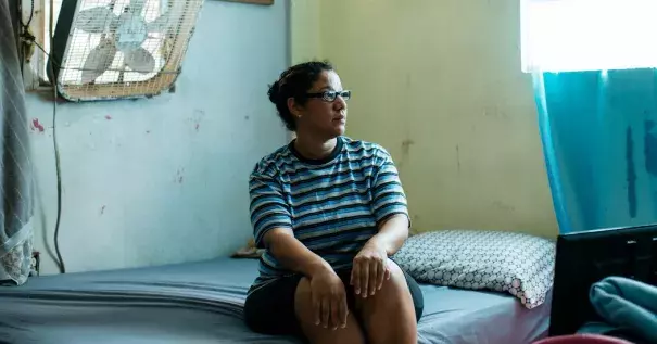 Milagros Serrano Ortiz at her home in Toa Baja, P.R., where at least nine people died and water levels peaked over 12 feet during Hurricane Maria. Photo: Erika P. Rodriguez for The New York Times