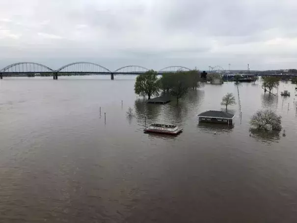 The flooded Mississippi River swamped portions of downtown Davenport this spring, reaching record-high levels in the area, following a wet fall and a snowy winter. Photo: Kate Payne, IPR