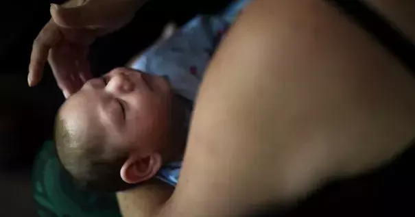 A mother in Puerto Rico and her 2-month-old son who was diagnosed with microcephaly linked to the Zika virus. Photo: Carlos Giusti, Associated Press