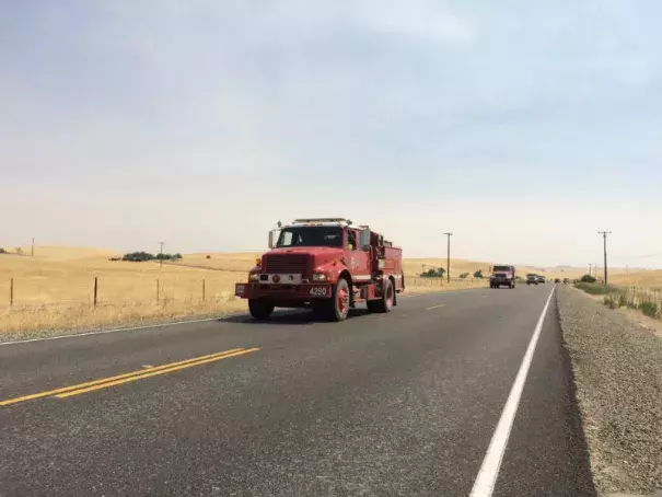 Trucks head toward the Detwiler Fire in Mariposa County on July 19, 2017. Photo: Bob Moffit, Capital Public Radio