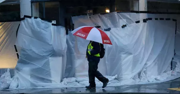 Storefronts were covered against a deluge in San Anselmo, in Marin County. Photo: Jeff Chiu, Associated Press