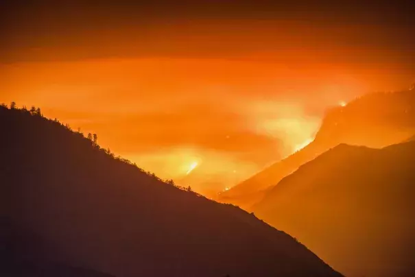 Known as the Rough Fire, a wildfire raged through national forests and parks in California from late July through October, burning about 152,000 acres and sending plumes of smoke over Central Valley cities such as Fresno, 35 miles away. Photo: Stuart Palley, Zuma, Corbis