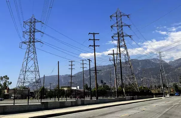 Electrical grid towers are seen during a heat wave where temperature reached 105 degrees Fahrenheit, in Pasadena, Calif. on Wednesday, Aug. 31, 2022. Operators of California’s power grid called for statewide voluntary conservation of electricity Wednesday as a heat wave spread over the West and they warned that there could be energy shortages if conditions worsen. (AP Photo/John Antczak)