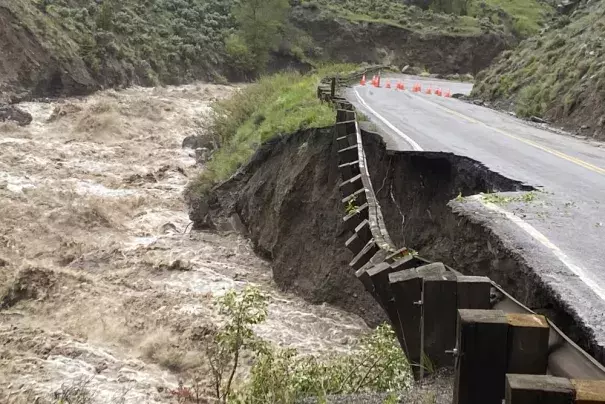 In this photo provided by the National Park Service, is high water in the Gardiner River along the North Entrance to Yellowstone National Park in Montana, that washed out part of a road on Monday, June 13, 2022. (Credit: National Park Service via AP)