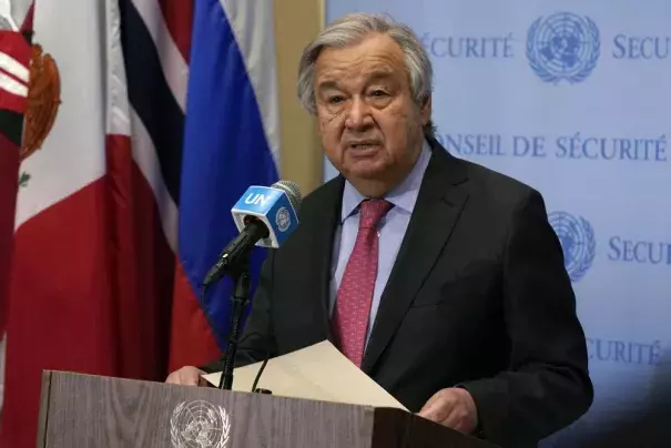 FILE - United Nations Secretary General Antonio Guterres makes a statement outside the Security Council at U.N. headquarters on March 14, 2022. Guterres announced Wednesday, March 23, 2022 a project to put every person on Earth in range of early warning systems for natural disasters, which have grown more powerful and frequent due to climate change, within five years. The project with the Geneva-based World Meteorological Organization aims to broaden the deployments and use of such climatic alert systems be