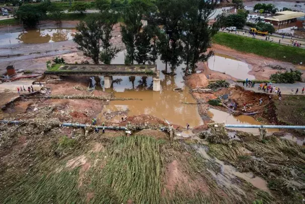 FILE - A collapsed bridge on the Griffiths Mxenge Highway after flooding, in Durban in Durban, South Africa, Wednesday, April 13, 2022. Devastating floods in South Africa this week, as well as other extreme weather events across the continent linked to human-caused climate change, are putting marine and terrestrial wildlife species at risk, according to biodiversity experts. (AP Photo/Shiraaz Mohamed, File)