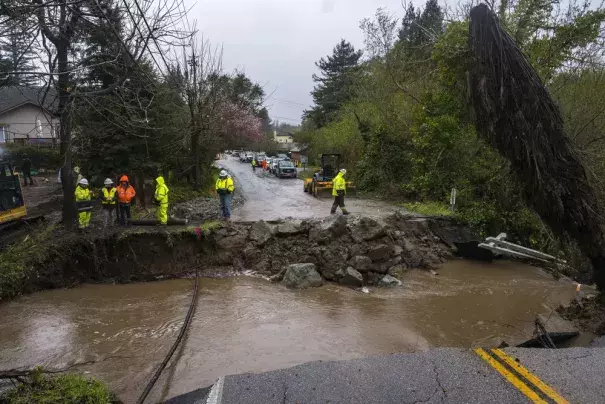 Crews assess storm damage, which washed out North Main Street in Soquel, Calif., Friday, March 10, 2023. (Credit: AP Photo/Nic Coury)