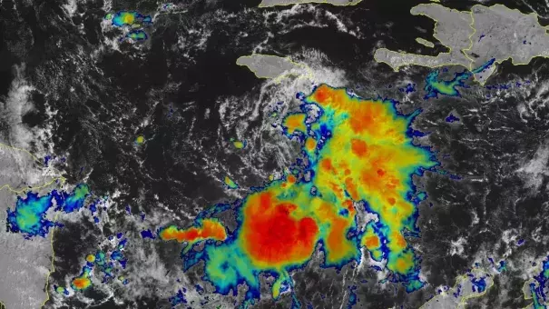 Infrared satellite image of Tropical Storm Lisa at 11:40 a.m. EDT October 31, 2022. (Image credit: NOAA via Yale Climate Connections)