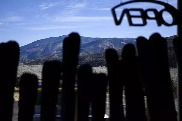 A view of the dry mountains from the window of Mt. Shavano Ski & Snowboard Shop in Salida, Colorado, on Jan. 4, 2018.Photo: AAron Ontiveroz/Denver Post via Getty Images