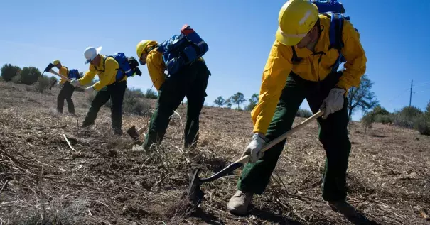 Trainees learned to dig a fire line at the Arizona Wildfire and Incident Management Academy at Embry-Riddle Aeronautical University in Prescott. The federal costs of fighting fires rose to $2 billion last year. Photo: Caitlin O'Hara, The New York Times