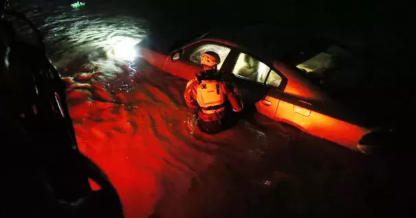 A rescue team inspects flooded areas after Hurricane Irma stuck Fajardo, Puerto Rico on Wednesday. Photo: Jose Jimenez / Getty Images