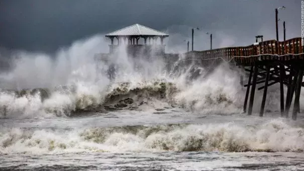 Waves crash around Oceanana Pier in Atlantic Beach, North Carolina, as the outer bands of Hurricane Florence begin to affect the coast on Thursday, September 13. Credit: CNN