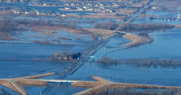 Rain, warm temperatures and snowmelt across the Midwest have caused floods that led to hundreds of evacuations and at least two deaths. Photo: Kent Sievers, Omaha World-Herald, via Associated Press