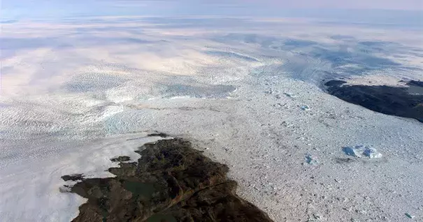 Patches of bare land are seen at the Jakobshavn glacier in Greenland in 2016, but the glacier ice has started to grow again, according to a study released on March 25, 2019. Study authors and outside scientists think this is temporary. Photo: NASA via AP
