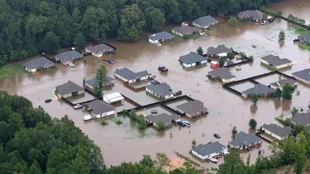 This aerial photo shows flooded homes along the Tangipahoa River near Amite, La., Saturday, Aug. 13, 2016. Photo: Ted Jackson / NOLA