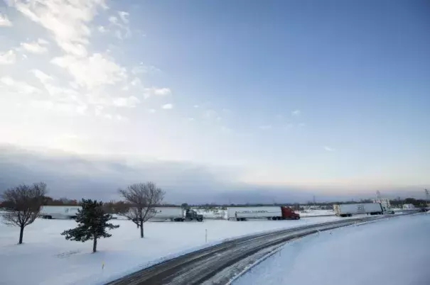 Trucks sit stranded on a closed New York state thruway in the town of Cheektowaga near Buffalo. Photo:Lindsay DeDario, Reuters