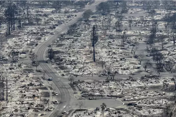 Entire neighborhoods were reduced to ash when a wildfire spread into Santa Rosa, California, in 2017. (Credit: Justin Sullivan/Getty Images)