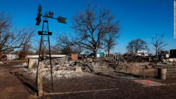 Scorched land and property are left behind on March 19 in Carbon, Texas, following the Eastland Complex Fire that came through two days earlier. (Credit: Rebecca Slezak/Dallas Morning News/AP) 