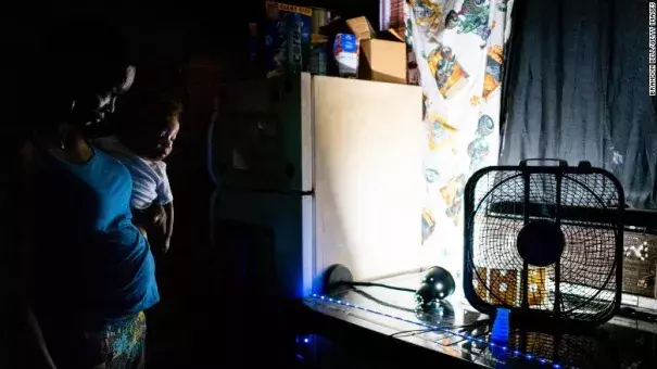 In Houston, Texas, Yvette Johnson says she uses seven fans and an air conditioning unit that "works barely" to try to keep her home cool. (Credit: Brandon Bell/Getty Images)