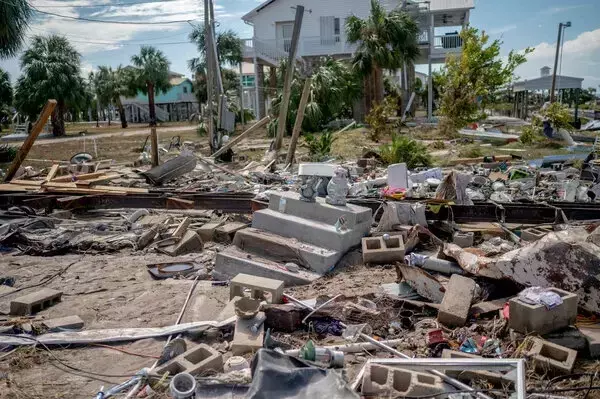 The remains of a home in Horseshoe Beach, Fla., after Hurricane Idalia in August. (Credit: Emily Kask for The New York Times)