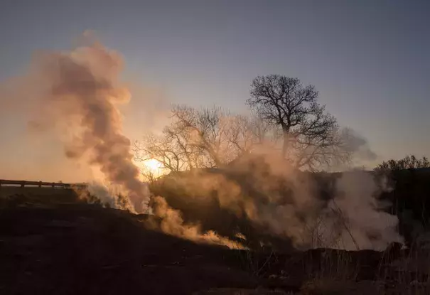 A highway west of Medicine Lodge, Kan. A wildfire that began on Tuesday in Oklahoma soon spread to Kansas. Photo: Craig Hacker, The New York Times