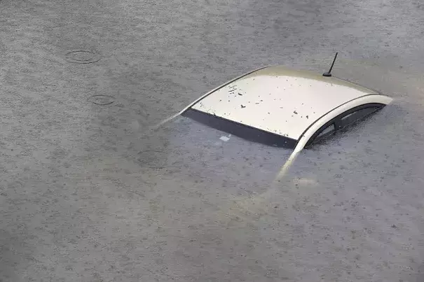 A submerged car on Interstate 610 North in Houston, as the city coped with flooding from the rain of Hurricane Harvey. Credit: Thomas Shea, Getty Images