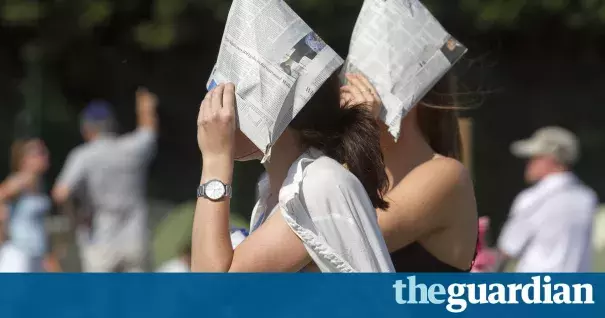 Tennis fans sought out what sheltered spots they could find. Photo: Amer Ghazzal, Rex Shutterstock