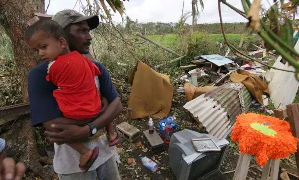 A Fijian resident looks at the damage caused by Cyclone Winston. Photo: AFP/Getty Images