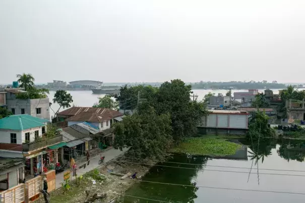 A pond with lower salinity levels that villagers in Dacope use to collect water for drinking and cooking. (Credit: Farzana Hossen/The Guardian)