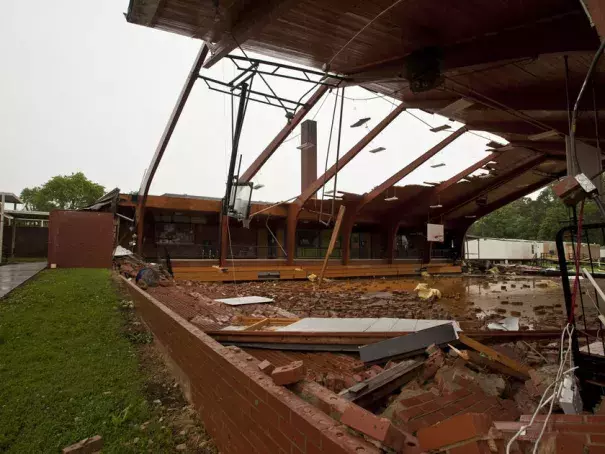 The roof was blown off the gym at Courtney Elementary School and the end walls were blown in by a tornado that passed through the area Wednesday. Photo: Walt Unks 