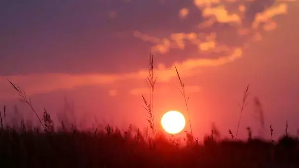 The sun sets over Swords Rimrock Park on the Rims on Sunday. July was one of the hottest and driest on record for Billings and elsewhere in Eastern Montana. Photo: Casey Page, Billings Gazette