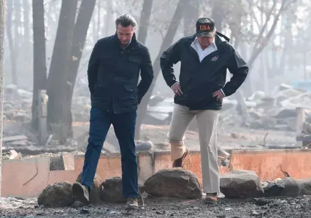 President Donald Trump and then-Lieutenant Gov. Gavin Newsom take a tour through Paradise 10 days after the fire started. Credit: Saul Loeb, Getty Images