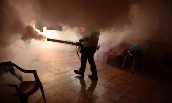 A home in El Salvador being fumigated to prevent the spread of the Zika virus. Photo: Marvin Recinos, AFP/Getty Images