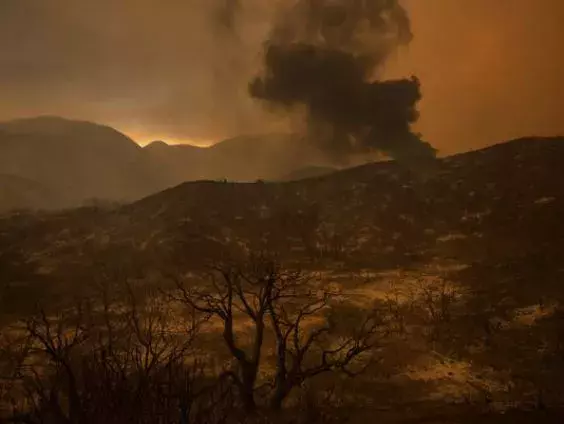 A scorched landscape is left smoldering at the Sand Fire on July 23 2016 near Santa Clarita, California. Photo: David McNew/ AFP-Getty