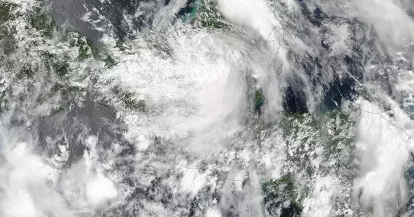 A NASA handout picture shows a true color image acquired from NASA-NOAA Suomi NPP satellite of Tropical Storm Earl over the Yucatan Peninsula, Mexico, on August 4. Image: NASA/NOAA, EPA